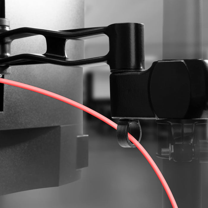Duronic Dual Spare Arm Set with integrated cable management clip holding a vibrant red power cable.