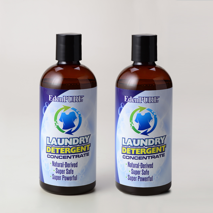 Two bottles of EdenPURE Natural Laundry Detergent Concentrate with blue and white labels on white background