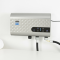 EdenPURE Oxileaf Laundry Wash System in silver with digital control panel and connected hoses on white background