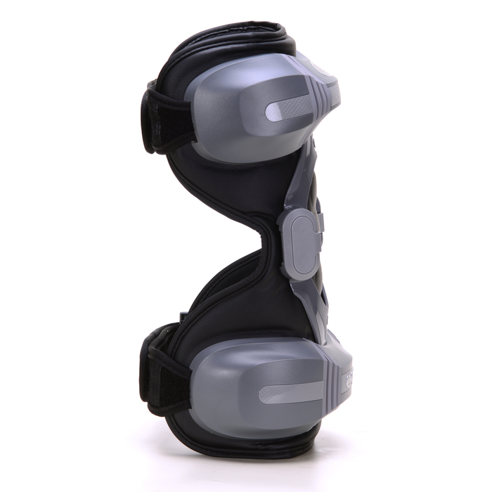 EdenPURE PainNOT Smart Joint Appliance in black and silver with adjustable straps isolated on white background