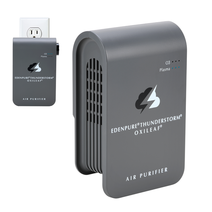 EdenPURE Thunderstorm Oxileaf III compact gray air purifier plugged into wall outlet with plasma indicator lights