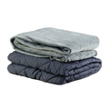 Folded EdenPURE Weighted Calming Blanket Small in gray with soft plush top layer and quilted bottom layer isolated on white background