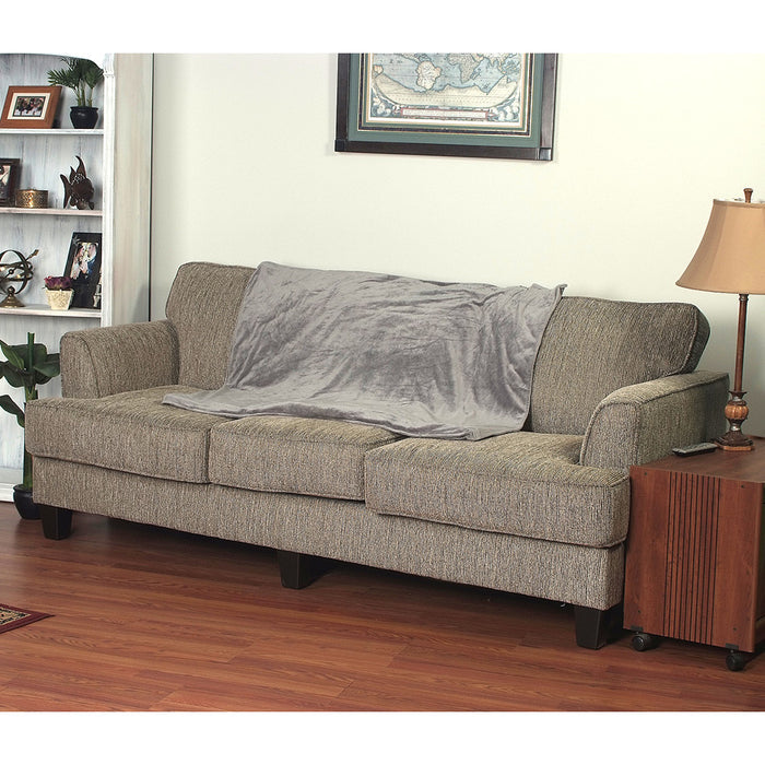 EdenPURE Weighted Calming Blanket Small in gray draped over brown fabric sofa in living room setting