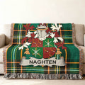 Green tartan throw blanket with Naghten family crest.