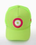 Green mahjong cap with a pink and white circular logo on a white background