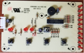 Front view of PC Control Board KN002 showing integrated circuits, resistors, capacitors, and connectors on beige circuit board
