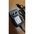 Power Supply Cord A5815 for Ball Fan Model A5853 with black AC adapter and attached power cable on wooden surface