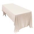 White table with elegant draped tablecloth