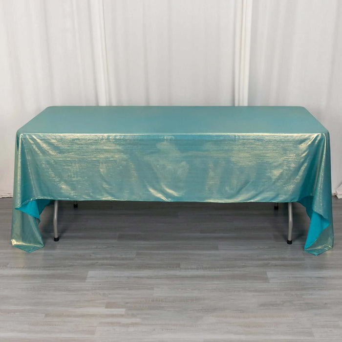 Turquoise table cover draped over a table for events or parties.