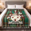 Vigors Irish family crest woven blanket displayed on a bed.