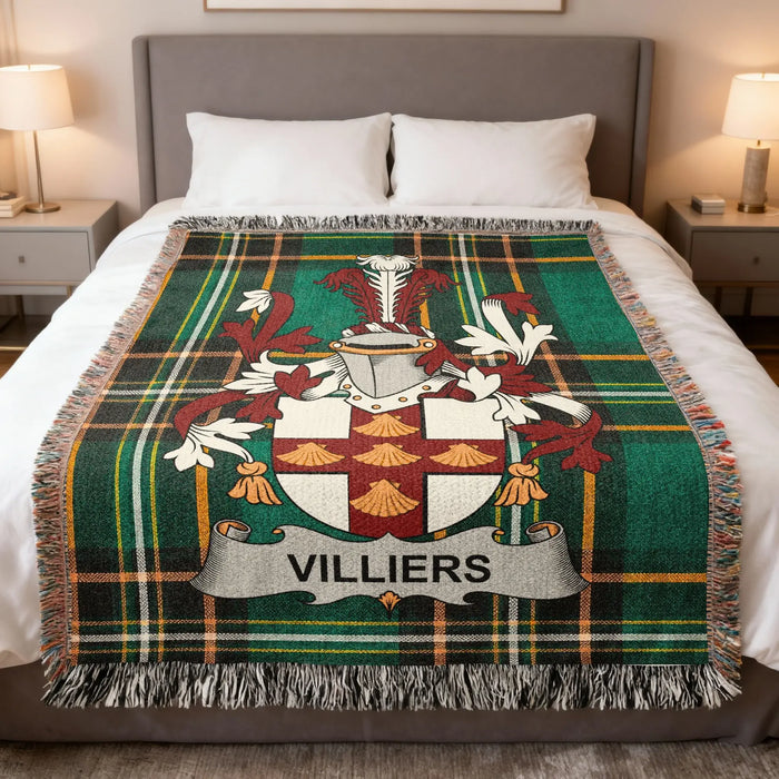 Villiers Irish family crest woven blanket displayed on a bed.