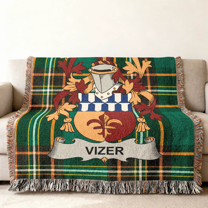 Vizer family crest on an Irish National Tartan woven cotton throw.