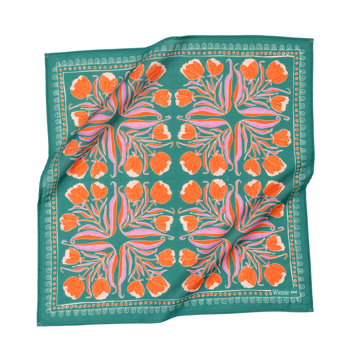Bold Floral patterned bandana scarf  with orange flowers on a green background