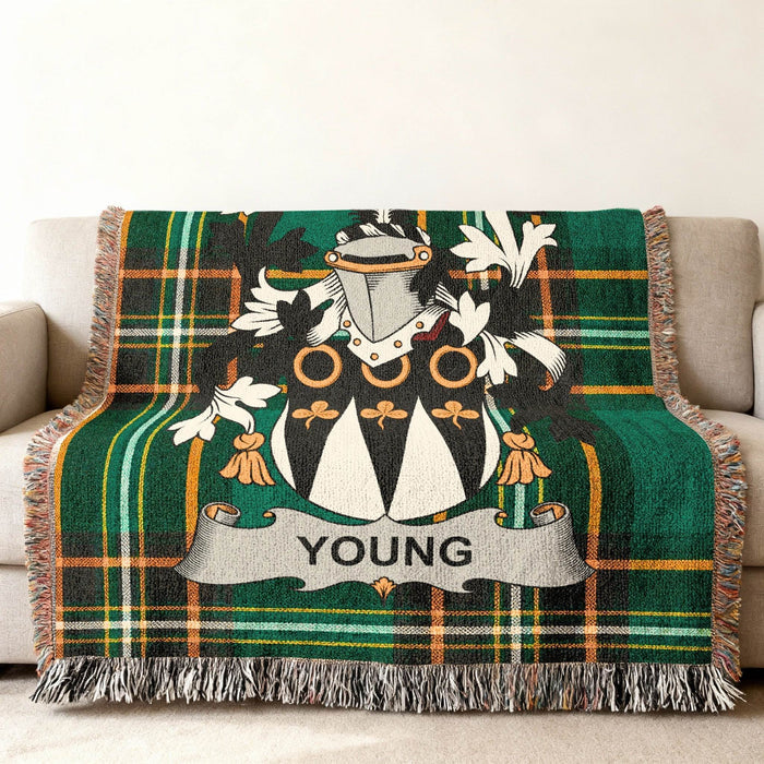 Young family crest on an Irish National Tartan woven cotton throw.